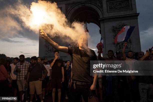 French supporters celebrates France's victory against Croatia in 2018 World Cup final in Place de l'Etoile on July 15, 2018 in PARIS, France.