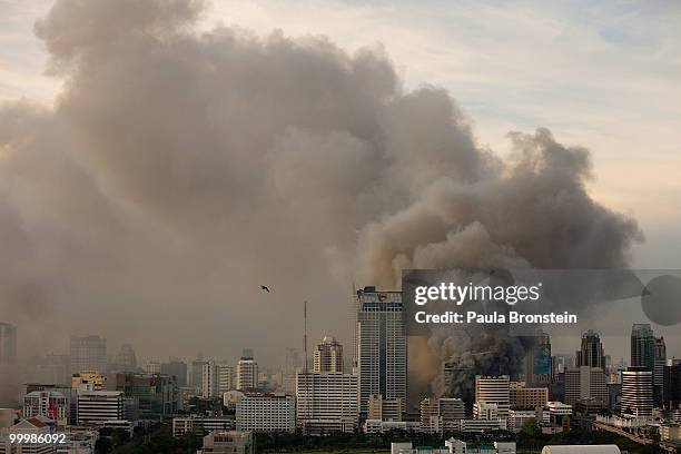 Downtown Bangkok burns after redshirts set fire to many building showing their anger against the government May 19, 2010 in Bangkok, Thailand. The...