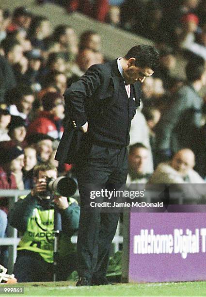Aston Villa Manager John Gregory can not bear to look as his team try in vain for a last mintue goal during the Worthington Cup fourth round match...