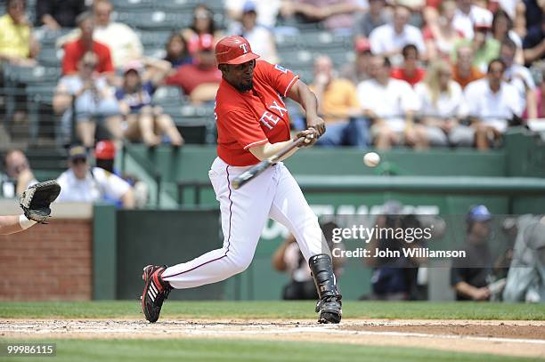 Designated hitter Vladimir Guerrero of the Texas Rangers bats during the game against the Oakland Athletics at Rangers Ballpark in Arlington in...