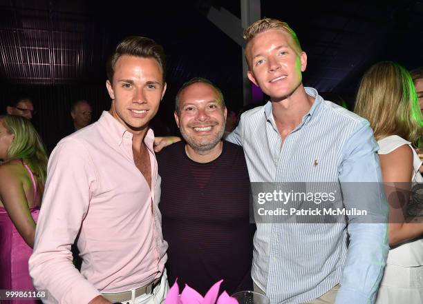 Ashley Cooper, Craig Dean and Warwick Brennand attend the Parrish Art Museum Midsummer Party 2018 at Parrish Art Museum on July 14, 2018 in Water...