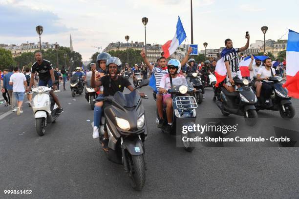 Fans celebrate the Victory of France in the World Cup 2018, on July 15, 2018 in Paris, France.