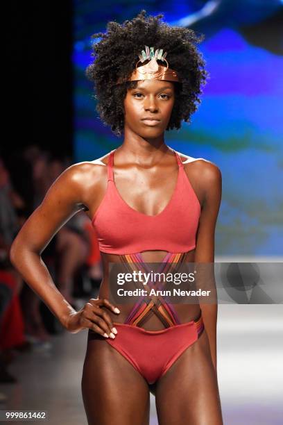 Model walks the runway for Pikai Swimwear at Miami Swim Week powered by Art Hearts Fashion Swim/Resort 2018/19 at Faena Forum on July 15, 2018 in...