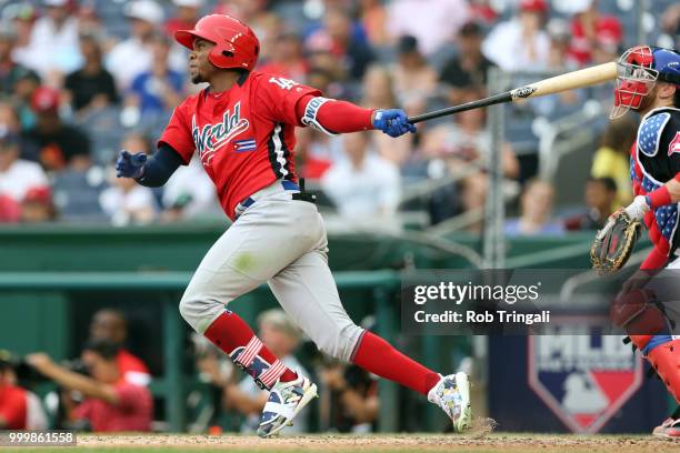 Yusniel Diaz of the World Team rounds the bases after hitting a home run in the seventh inning during the SiriusXM All-Star Futures Game at Nationals...