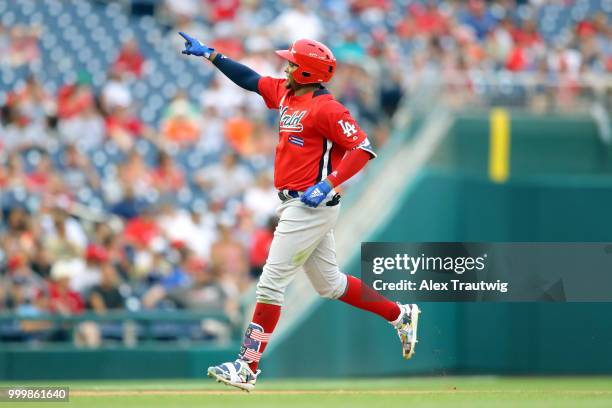 Yusniel Diaz of the World Team rounds the bases after hitting a home run in the seventh inning during the SiriusXM All-Star Futures Game at Nationals...