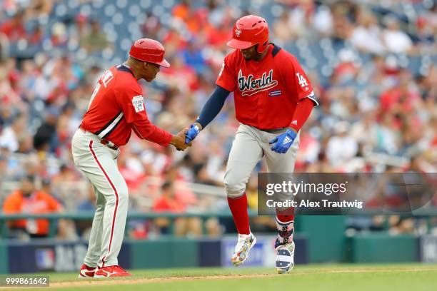 Yusniel Diaz of the World Team rounds the bases after hitting a home run in the seventh inning during the SiriusXM All-Star Futures Game at Nationals...