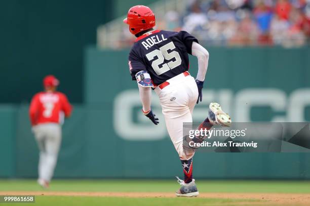 Jo Adell of Team USA doubles in the seventh inning during the SiriusXM All-Star Futures Game at Nationals Park on Sunday, July 15, 2018 in...