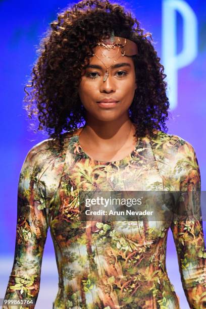 Model walks the runway for Pikai Swimwear at Miami Swim Week powered by Art Hearts Fashion Swim/Resort 2018/19 at Faena Forum on July 15, 2018 in...