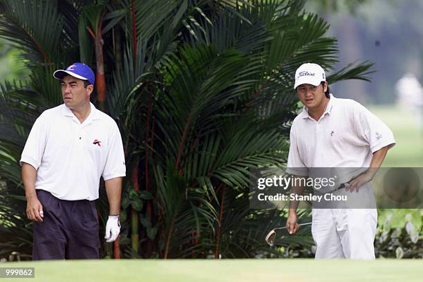 Dominique Boulet and Derek Fung of Hong Kong in a discussion at the 13th hole during the Second Round of the Foursome Stroke Play during the Davidoff...