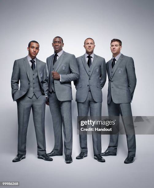 In this undated handout image provided by M&S, Theo Walcott, Emile Heskey, Matthew Upsom and Steven Gerrard of the England World Cup squad pose for a...