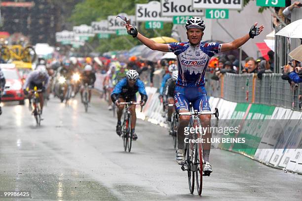 Russia's Evgeny Petrov crosses the finish line of the 11st stage of the 93rd Giro d'Italia going from Lucera to L'Aquila in victory on May 19, 2010...