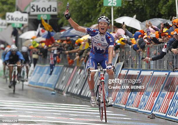 Russia's Evgeny Petrov crosses the finish line of the 11st stage of the 93rd Giro d'Italia going from Lucera to L'Aquila in victory on May 19, 2010...