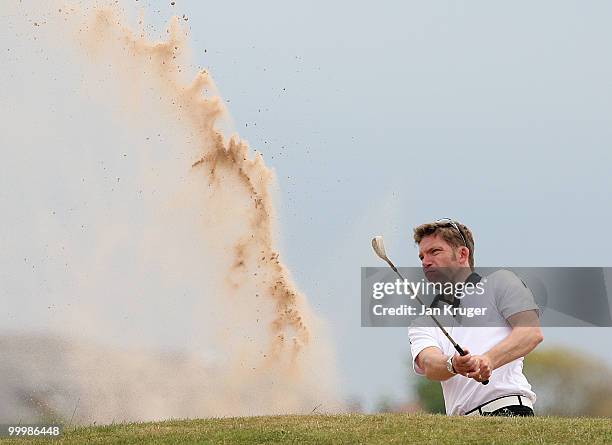 Gavin Beddow of Vicars Cross plays from a bunker during the Virgin Atlantic PGA National Pro-Am Championship regional final at St Annes Old Links...