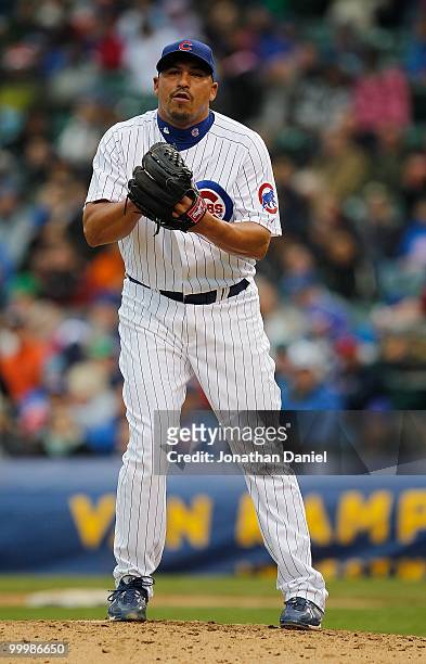 Carlos Zambrano of the Chicago Cubs pitches against the Florida Marlins at Wrigley Field on May 12, 2010 in Chicago, Illinois. The Cubs defeated the...