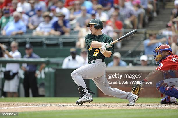 Cliff Pennington of the Oakland Athletics bats during the game against the Texas Rangers at Rangers Ballpark in Arlington in Arlington, Texas on...