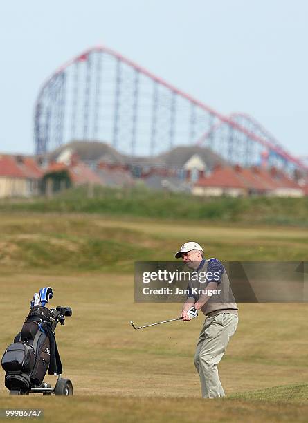 Competitor plays an approach shot during the Virgin Atlantic PGA National Pro-Am Championship regional final at St Annes Old Links Golf Club on May...