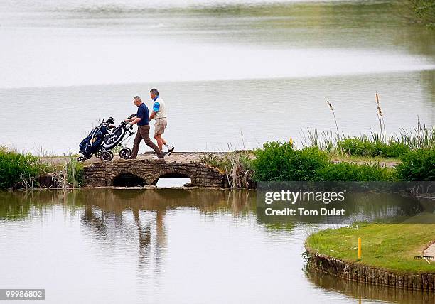 Players cross the bridge during the Business Fort plc English PGA Championship Regional Qualifier at Cumberwell Park Golf Club on May 19, 2010 in...