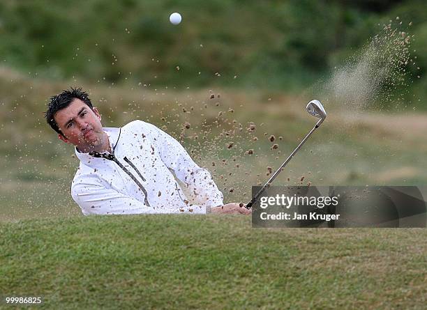 Scott Astin of Hesketh plays from the a bunker during the Virgin Atlantic PGA National Pro-Am Championship regional final at St Annes Old Links Golf...