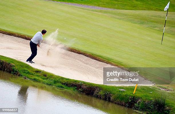 John Goymer of The Mendip plays out of the bunker on 16th hole during the Business Fort plc English PGA Championship Regional Qualifier at Cumberwell...