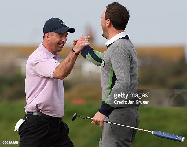 Andrew Richardson celebrate his eagle with partner Dan Morley of Blackpool North Shore during the Virgin Atlantic PGA National Pro-Am Championship...