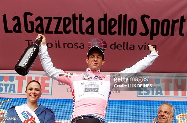 Australian Richie Porte clebrates with the pink jersey of leader of the 93rd Giro d'Italia on the podium of the11 st stage going from Lucera to...