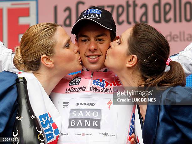 Australian Richie Porte celebrates with the pink jersey of leader of the 93rd Giro d'Italia on the podium of the11 st stage going from Lucera to...