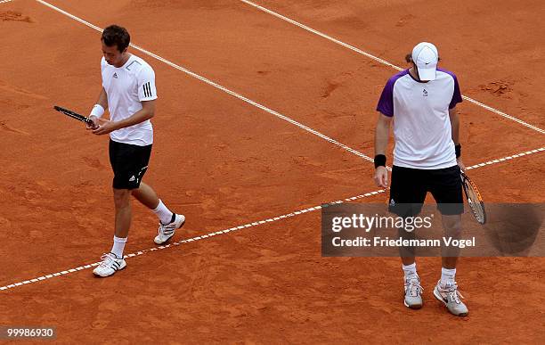 Philip Kohlschreiber and Christopher Kas of Germany looks on during the double match against Juan Monaco and Horacio Zeballos of Argentina during day...