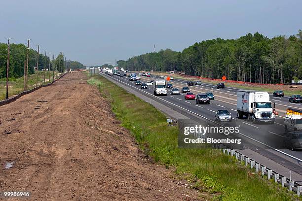 Land is leveled next to the New Jersey Turnpike near Chesterfield, New Jersey, U.S., on Friday, May 14, 2010. New Jersey, the third-most indebted...