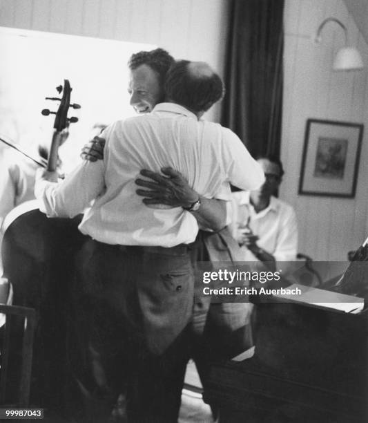 Russian cellist Mstislav Rostropovich embraces English composer Benjamin Britten in the music room of Britten's house in Aldeburgh, Suffolk, 1st July...