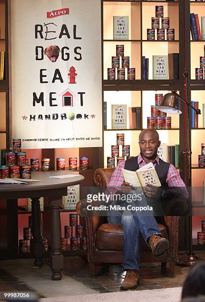 Actor Taye Diggs reads at the ALPO "Real Dogs Eat Meat" handbook launch at the Chelsea Market on May 19, 2010 in New York City.