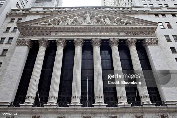 The New York Stock Exchange stands in New York, U.S., on Wednesday, May 19, 2010. U.S. Stocks fluctuated as the euro rebounded on speculation...
