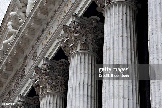 The New York Stock Exchange stands in New York, U.S., on Wednesday, May 19, 2010. U.S. Stocks fluctuated as the euro rebounded on speculation...