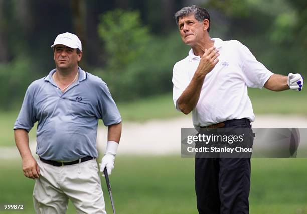 Costantino Rocca and Baldovina Dassu of Italy exchanging views at the 13th hole during the Second Round of the Foursome Stroke Play during the...