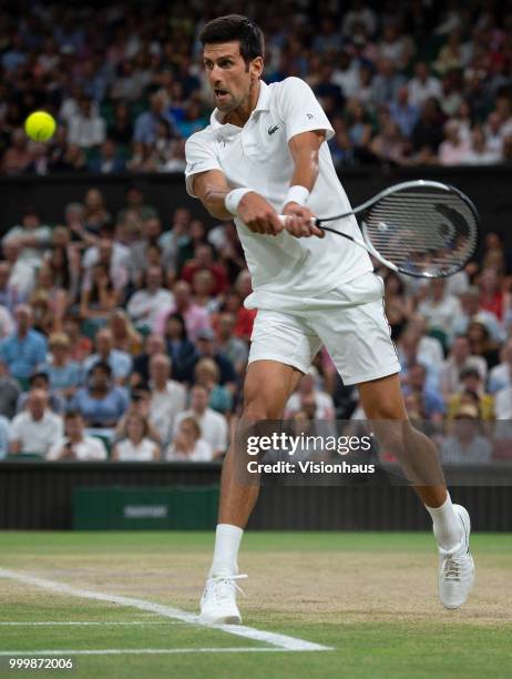 Novak Djokovic of Serbia during his semi-final match against Rafael Nadal of Spain on day eleven of the Wimbledon Lawn Tennis Championships at the...