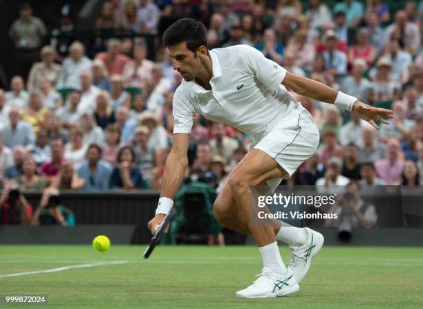 Novak Djokovic of Serbia during his semi-final match against Rafael Nadal of Spain on day eleven of the Wimbledon Lawn Tennis Championships at the...