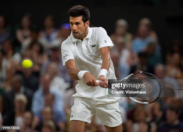 Novak Djokovic of Serbia during his semi-final match against Rafael Nadal of Spain on day eleven of the Wimbledon Lawn Tennis Championships at the...