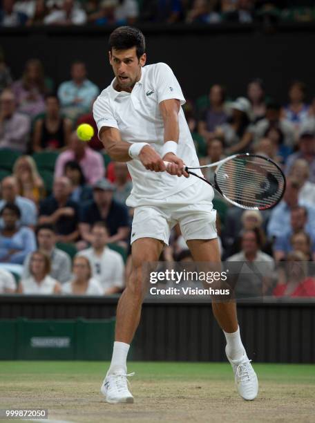 Novak Djokovic of Serbia during his semi-final match against Rafael Nadal of Spain on day eleven of the Wimbledon Lawn Tennis Championships at the...