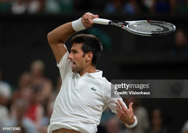 Novak Djokovic of Serbia during his semi-final match against Rafael Nadal of Spain on day eleven of the Wimbledon Lawn Tennis Championships at the...