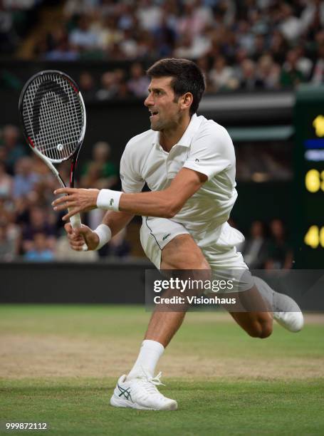 Novak Djokovic of Serbia during his semi-final match against Rafael Nadal of Spain on day eleven of the Wimbledon Lawn Tennis Championships at the...