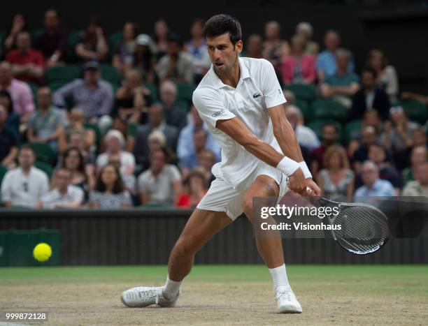 Novak Djokovic of Serbia during his semi-final match against Rafael Nadal of Spain on day eleven of the Wimbledon Lawn Tennis Championships at the...