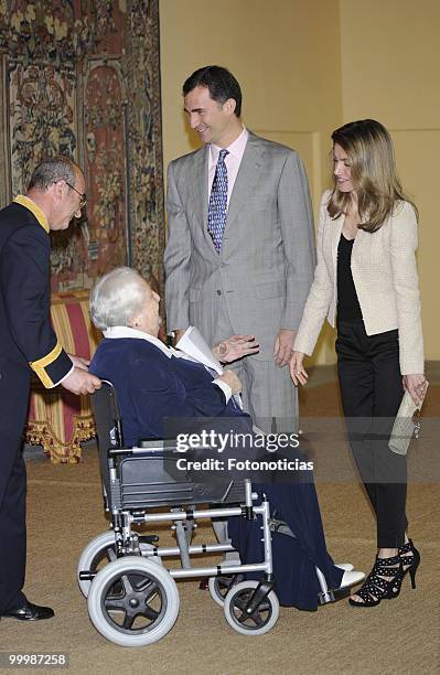 Prince Felipe of Spain and Princess Letizia of Spain receive members of the 'Principe de Girona' foundation, at El Pardo Palace on May 19, 2010 in...