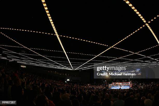 Amir Khan of Great Britain and Paulie Malignaggi exchange blows during the WBA light welterweight title fight at Madison Square Garden on May 15,...