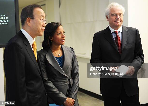 United Nations Secretary General Ban Ki-Moon with Susan Rice , United States Ambassador to the UN and Vitaly Churkin , Russia's Ambassador to the UN...