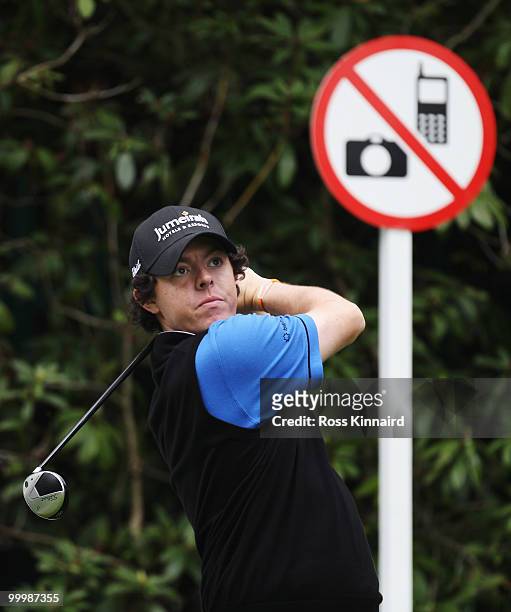 Rory McIlroy of Northern Ireland plays a tee shot during the Pro-Am round prior to the BMW PGA Championship on the West Course at Wentworth on May...