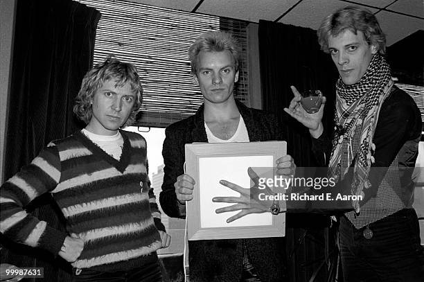 The Police posed in the offices of A&M Records in New York City on April 04 1979 L-R Andy Summers, Sting, Stewart Copeland