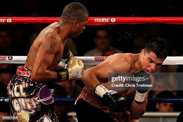 Victor Ortiz and Nate Campbell exchange blows during the super lightweight fight at Madison Square Garden on May 15, 2010 in New York City.