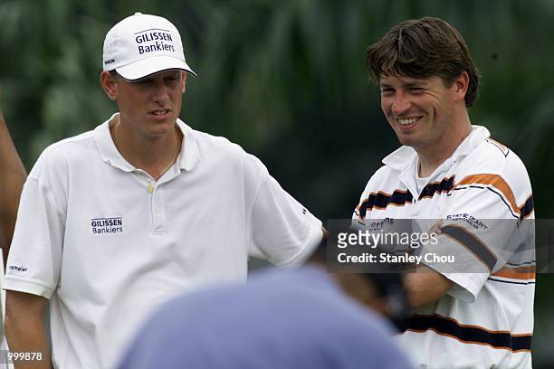 Maarten Lafeber and Robert Jan Derksen of Holland seem having a joke at the 18th hole during the Second Round of the Foursome Stroke Play during the...