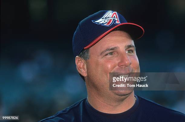 Manager Mike Scioscia of the Anaheim Angels looks on during the game against the New York Yankees at Edison International Field on April 3, 2000 in...