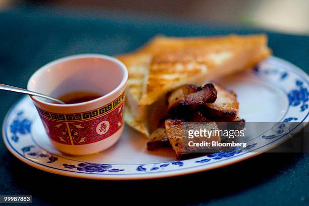 The bacon platter is arranged for a photo at Fatty 'Cue restaurant in the Brooklyn borough of New York, U.S., on Monday, May 17, 2010. Fatty 'Cue is...
