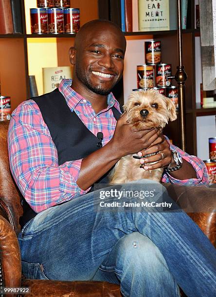 Taye Diggs hangs out with his dog Sammy after hosting a first-of-its-kind book reading event to launch the ALPO �Real Dogs Eat Meat� Handbook, which...